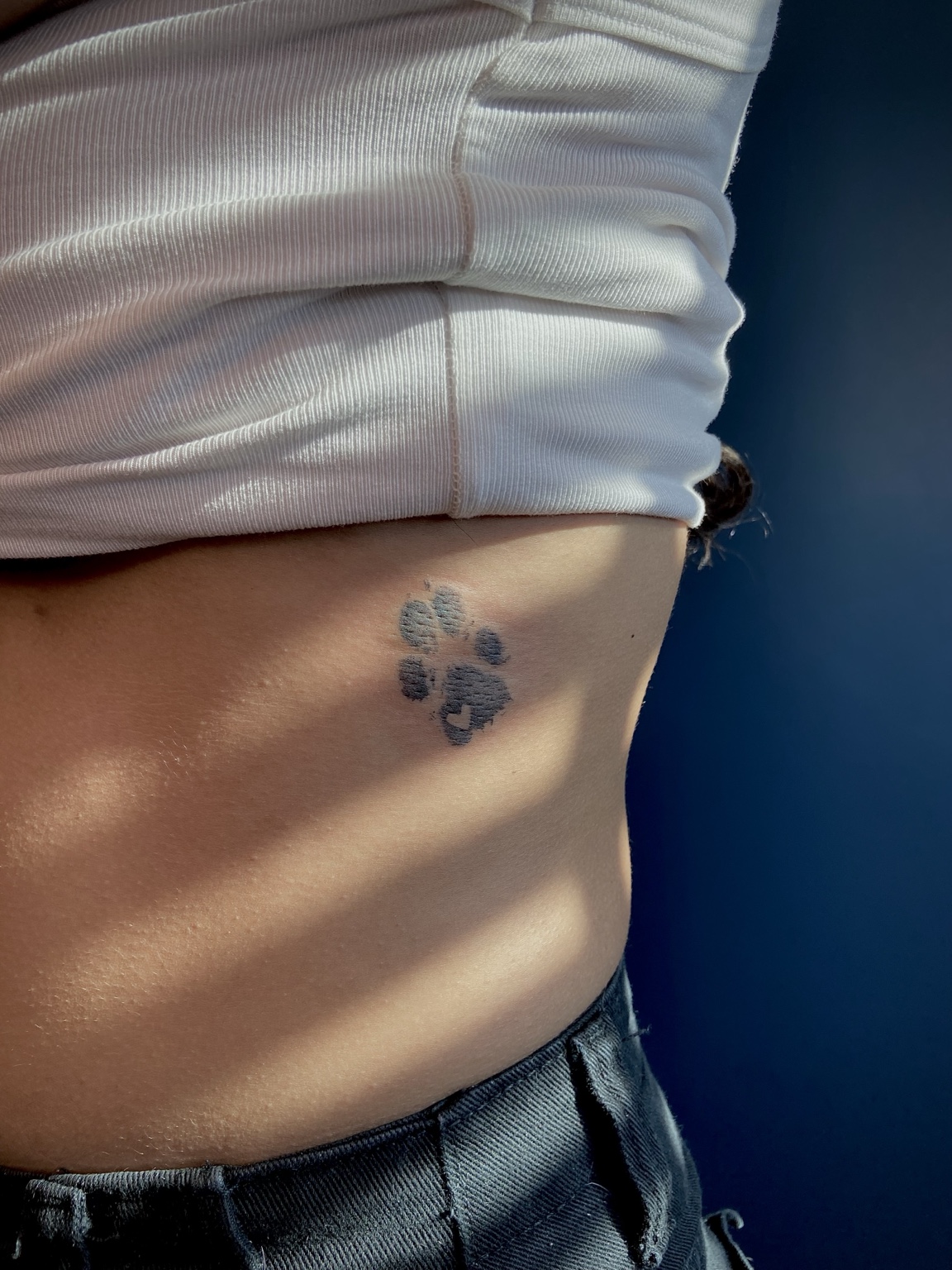 Tatuagem de impressão de pata